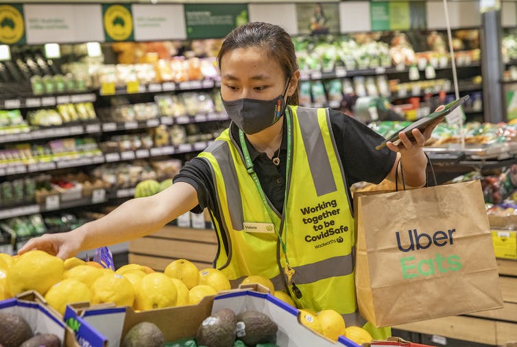 Both Coles and Woolworths have raced to implement new technology and change labour arrangements to keep pace with a boom in e-commerce, investing in 'smart' warehousing and distribution systems and using app-driven gig workers for grocery picking and delivery.
