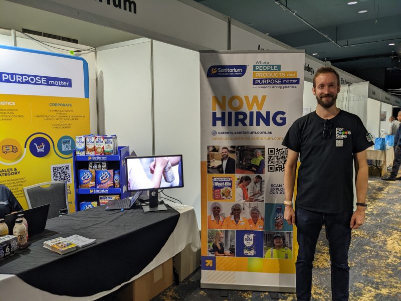 Luke McQuillan visiting the Sanitarium Health Food Company stand at the Central Coast Industry Festival